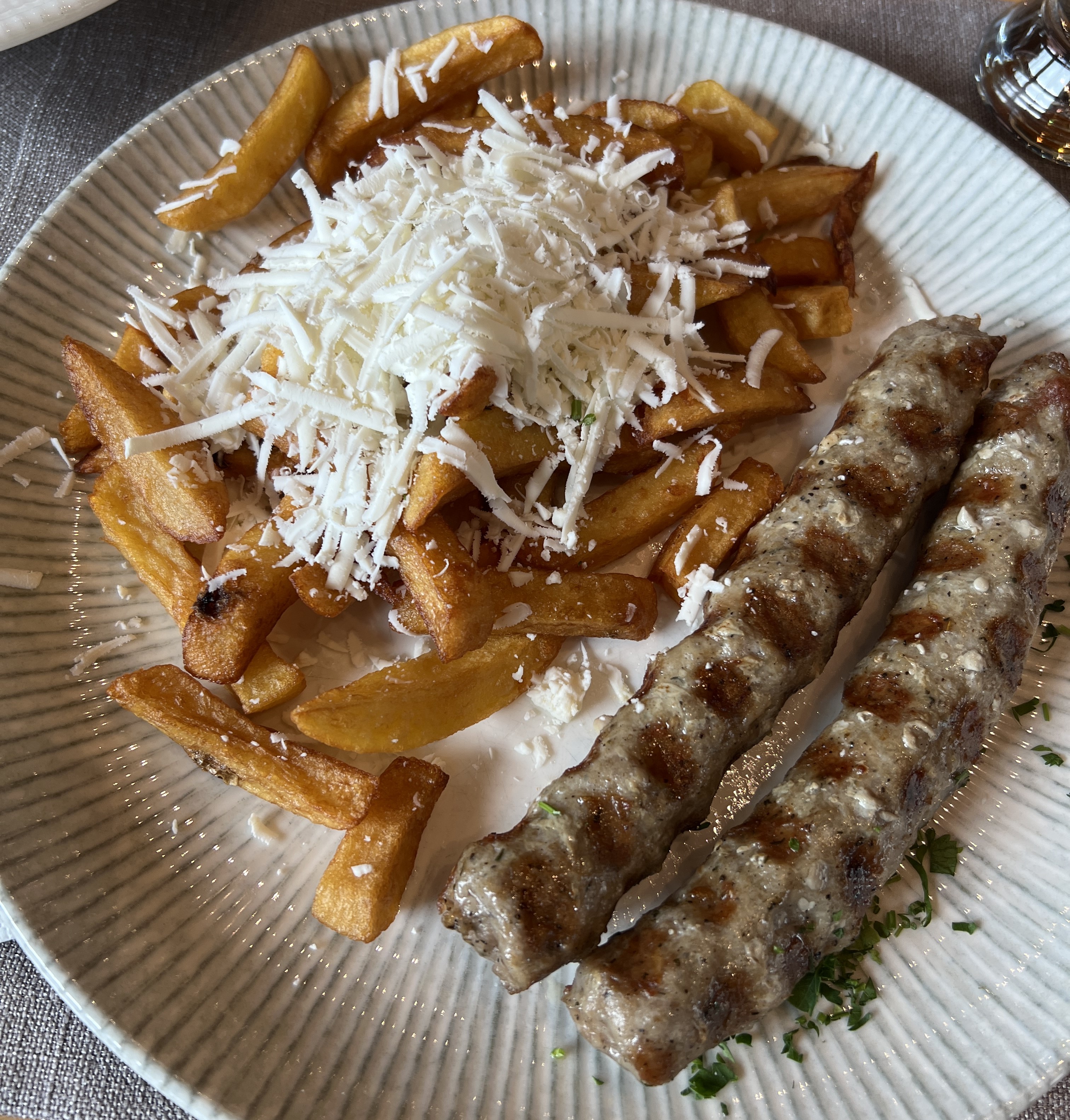 Kebabche Bulgarian grilled kebabs perfect with a side of fries and feta