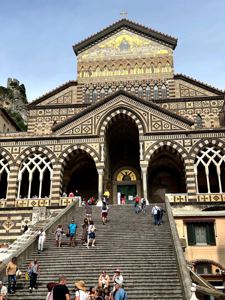 The striped Duomo cathedral and staircase in Amalfi