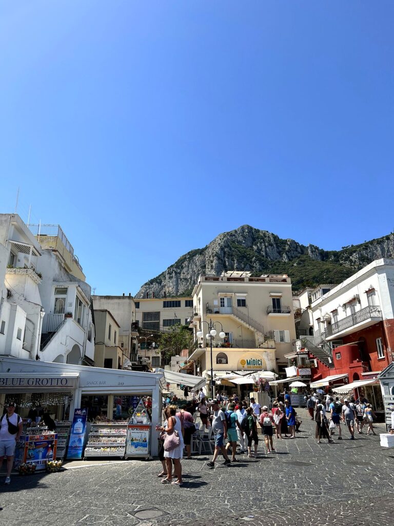 Whitewashed street and shops in Capri town near the Piazzetta