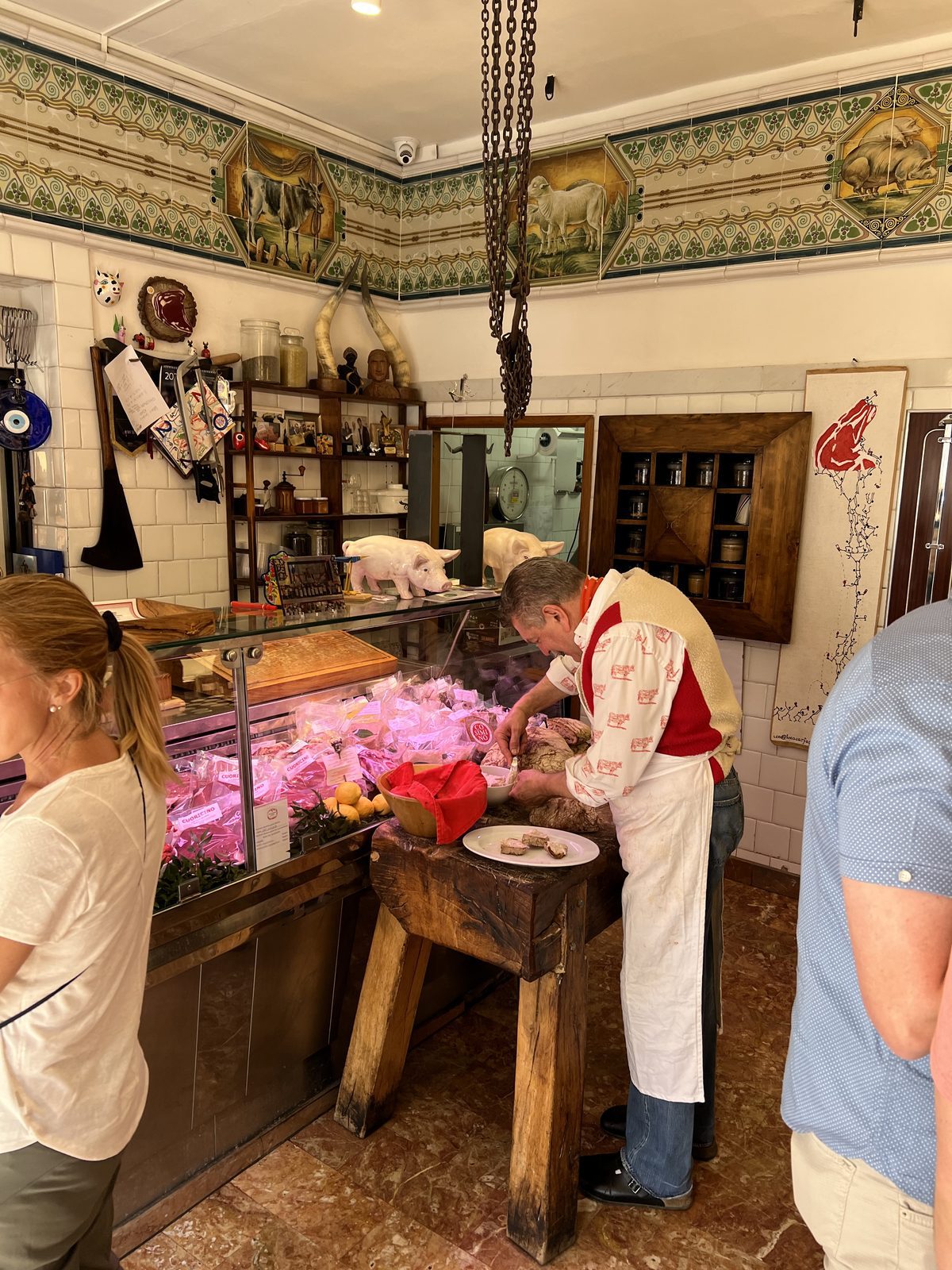 Butchers at work inside Dario Cecchini butcher shop in Chianti