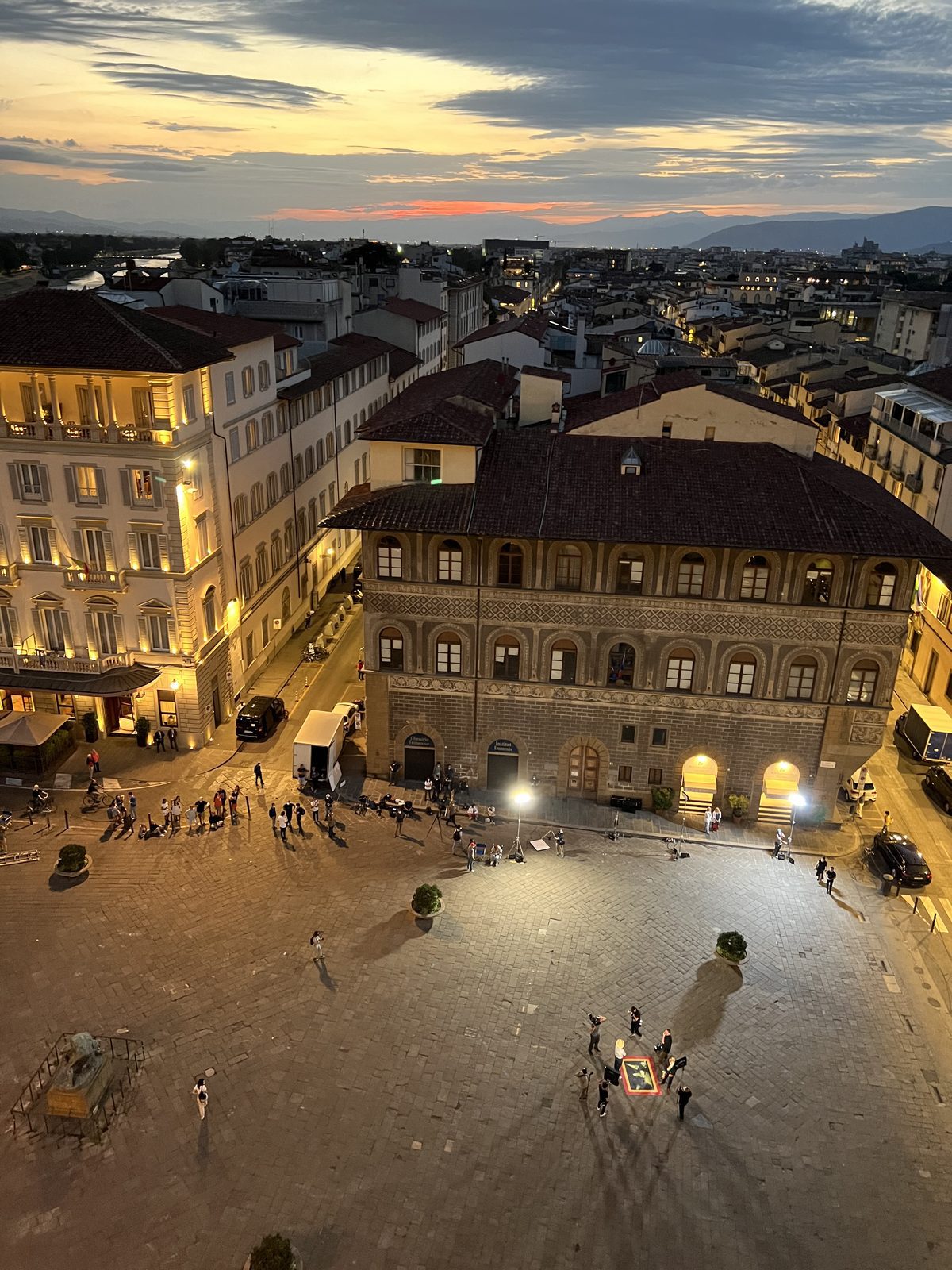 Sunset over the piazza and the Arno seen from the Westin Excelsior rooftop bar in Florence