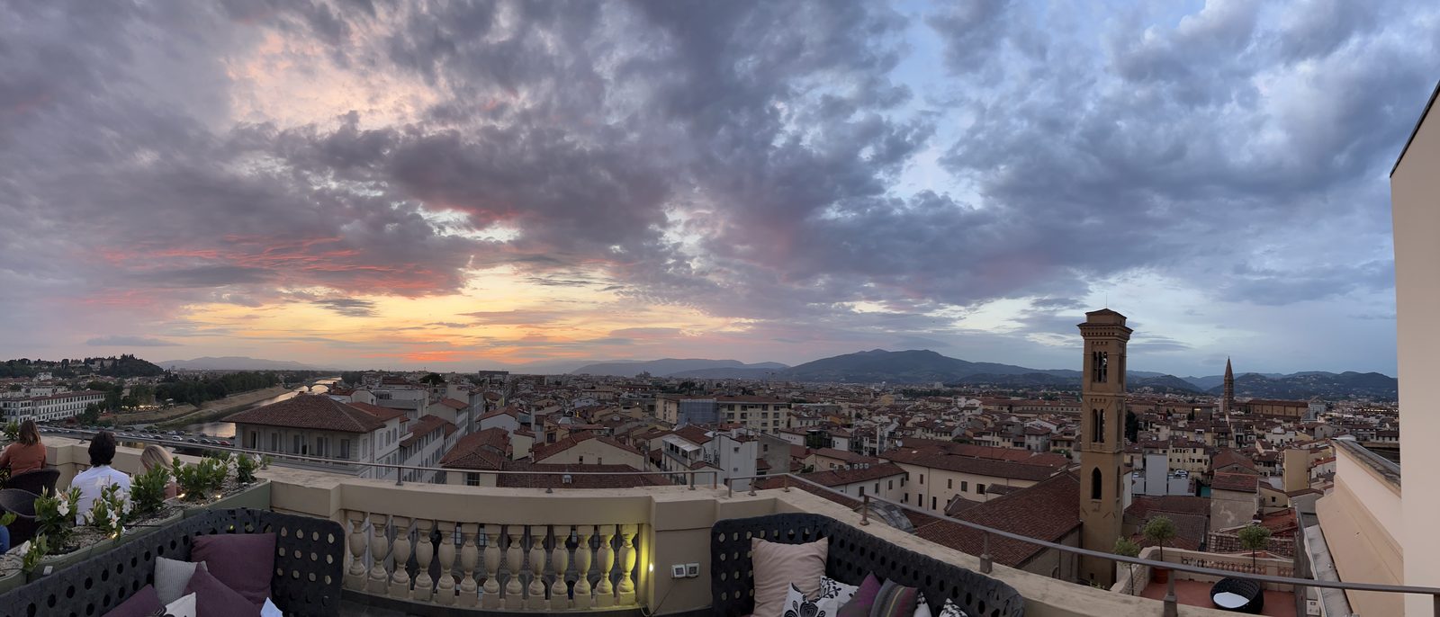 The rooftop bar terrace at the Westin Excelsior in Florence at sunset