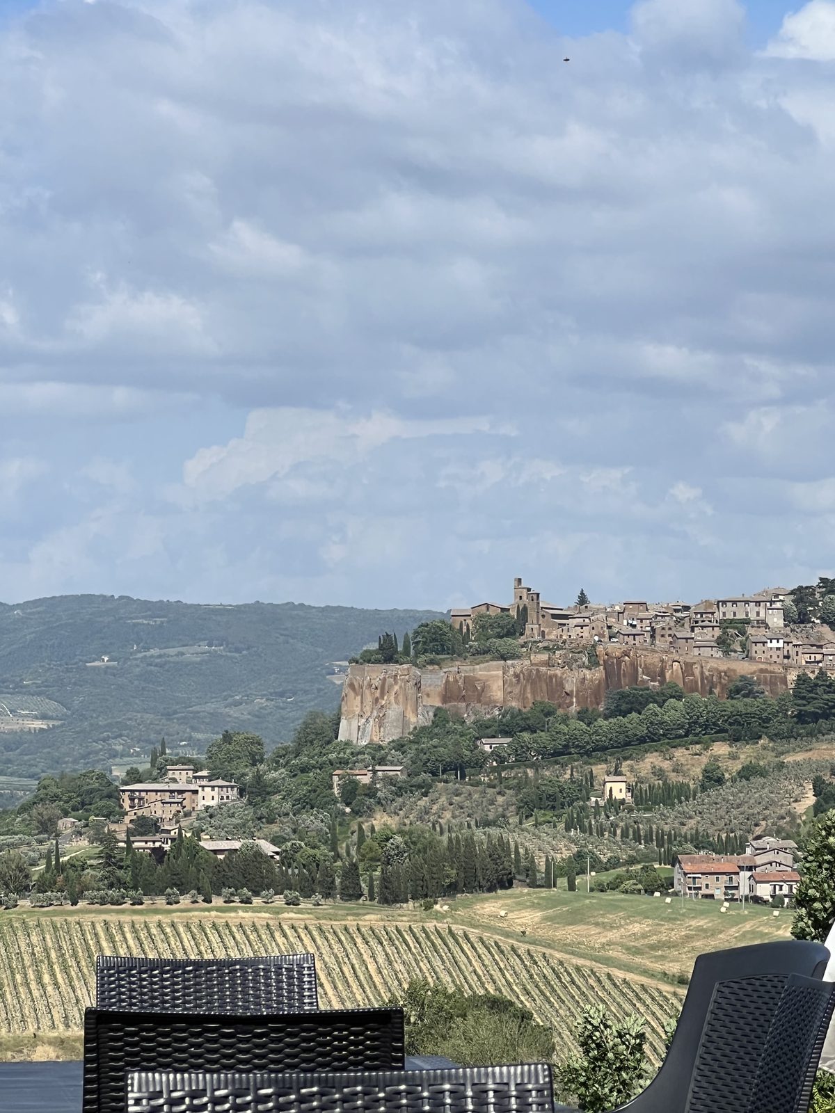 The clifftop town of Orvieto perched on volcanic tufa cliffs above the countryside, an easy day trip stop
