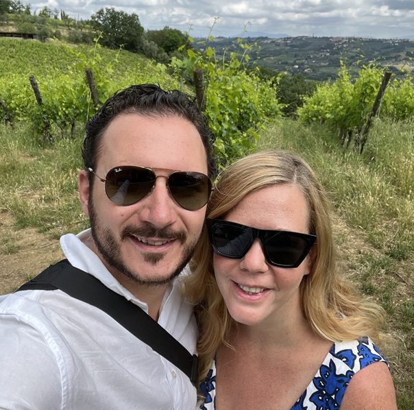 A couple in a Chianti vineyard on a wine tour from Florence