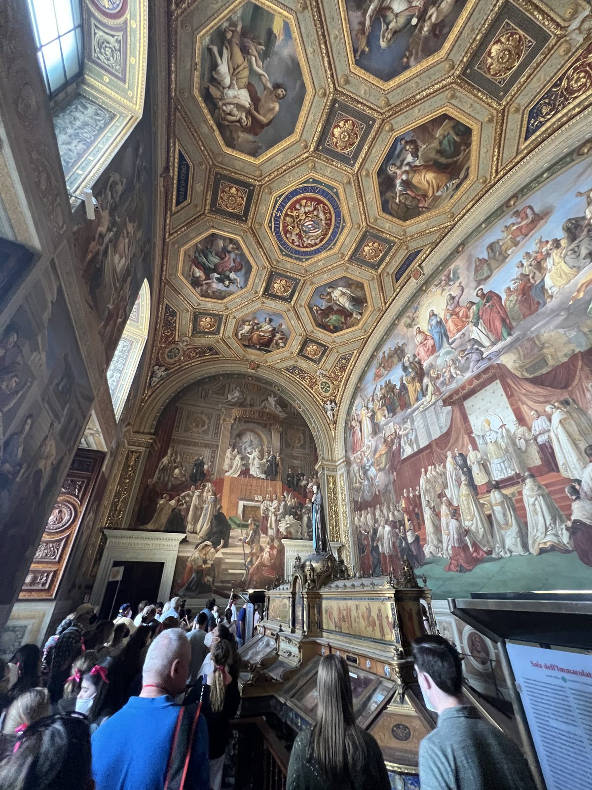 A painted and frescoed gallery ceiling inside the Vatican Museums