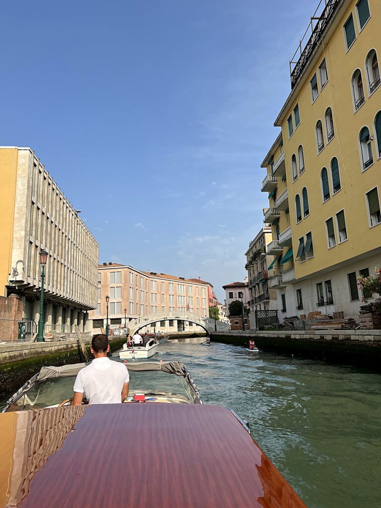 Private water taxi ride through the canals of Venice